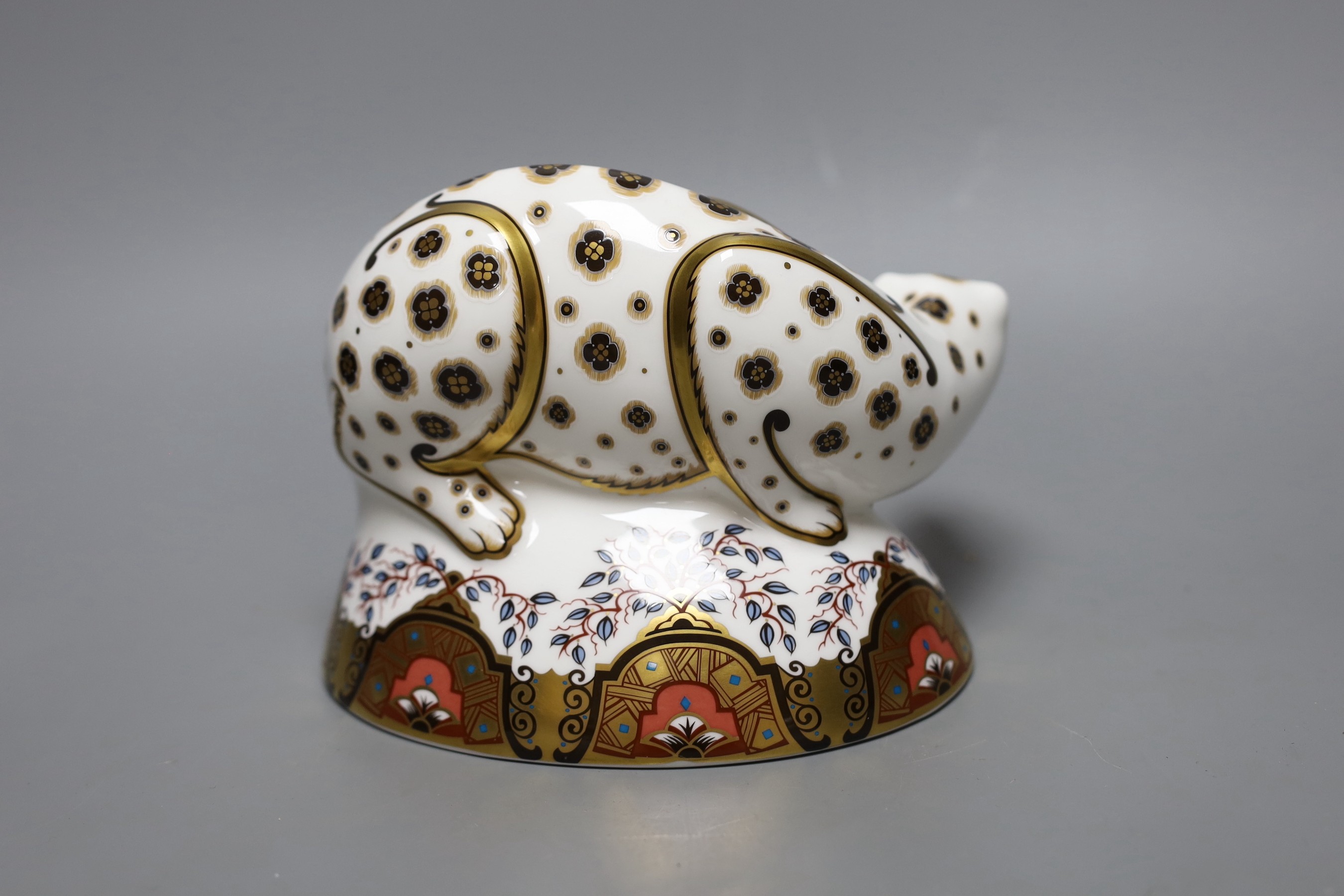A Royal Crown Derby paperweight - Snow Leopard, gold stopper, box, no certificate